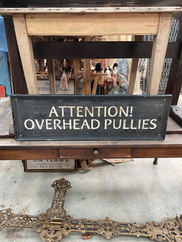 'Attention! Overhead Pullies' sign, painted onto framed wooden backboard Film TV Props