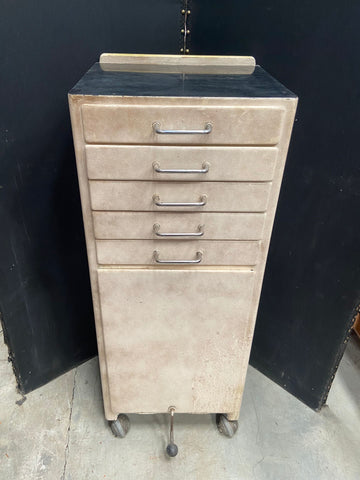 White medical storage drawers in an aged condition.&nbsp;