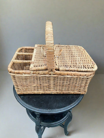 Traditional wicker picnic basket, designed to hold three bottles.