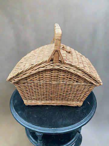 Traditional double-lidded wicker picnic basket.
