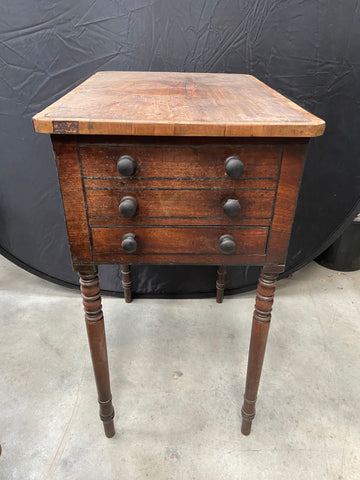 Long wooden vintage bedside table with an unusual hinged wooden top.