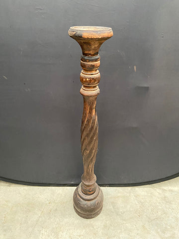 Mango wood torchiere with a twisted stem and rustic, handcrafted finish.&nbsp;