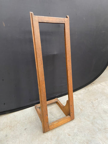 Large surfboard stand with solid wood construction. Designed to hold one board.