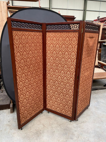 Three-panel privacy/modesty/folding screen with a patterned fabric face. Likely Victorian.