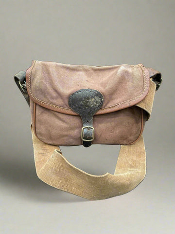 Early 20th-century brown canvas shotgun cartridge satchel.