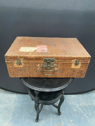 Vintage woven rattan suitcase with pasted labels to the lid. Could be of Chinese origin.&nbsp;