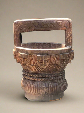Carved Water Carrier