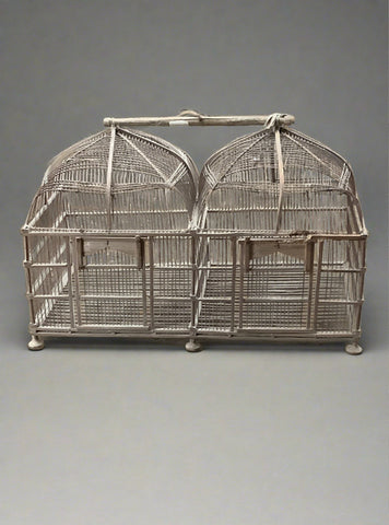 Indonesian-style footed wooden double birdcage. Hand weaved with a carrying handle.