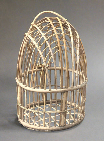 Tall woven bamboo cage for birds/chickens with looped handle.