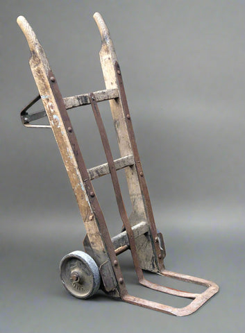 Sturdy antique wooden sack truck with metal detailing - great action prop for SAs. In good condition with little wear.