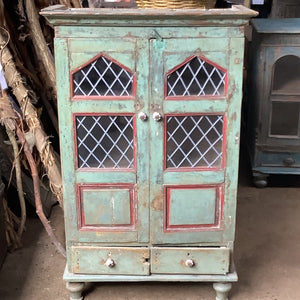 French style antique cabinet, painted red and sea green with latticed windows.