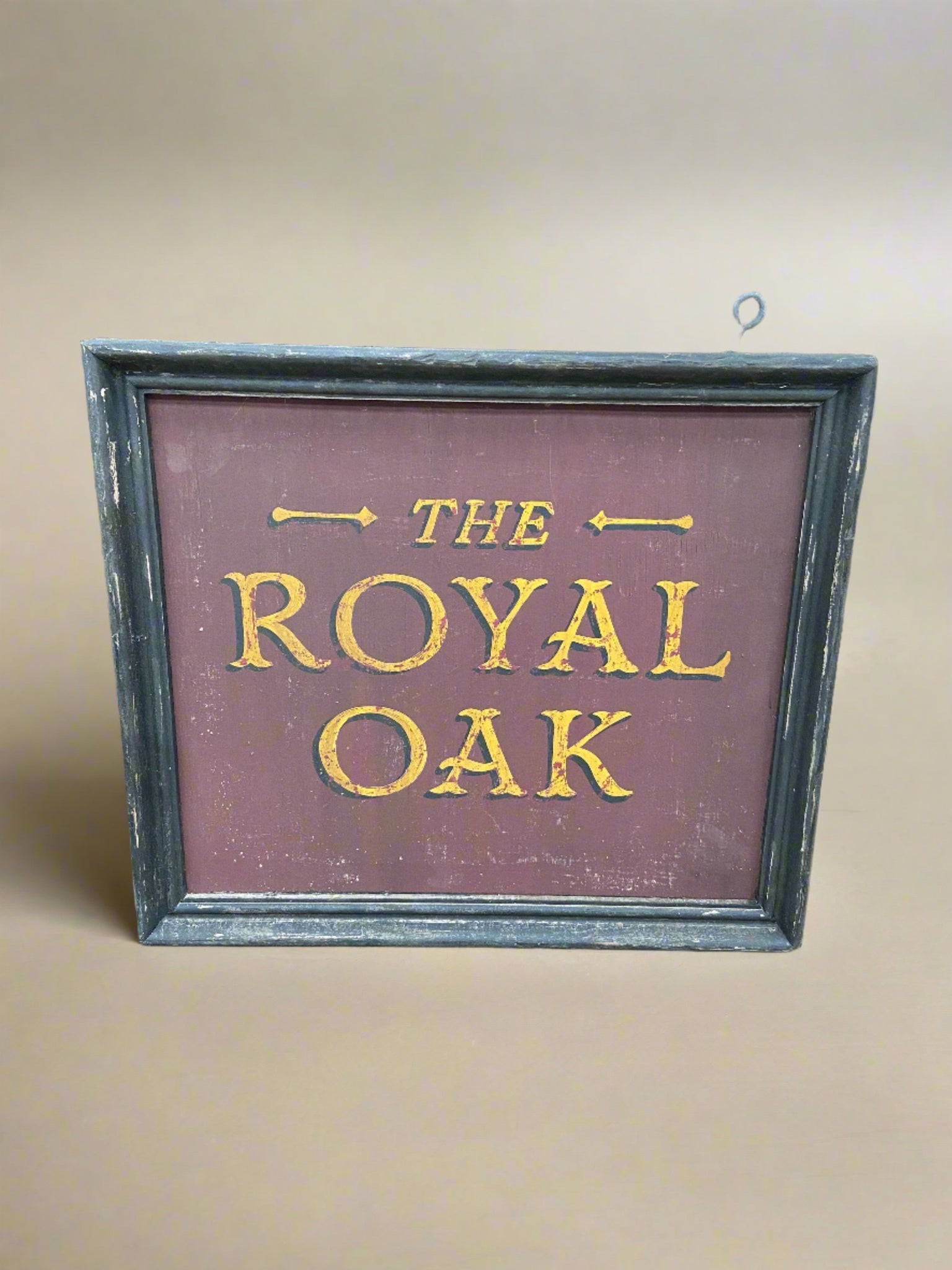 The Royal Oak framed wooden pub sign.