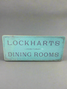 'Lockhart's Dining Room' signage, handpainted on teal wooden backboard Film TV Props