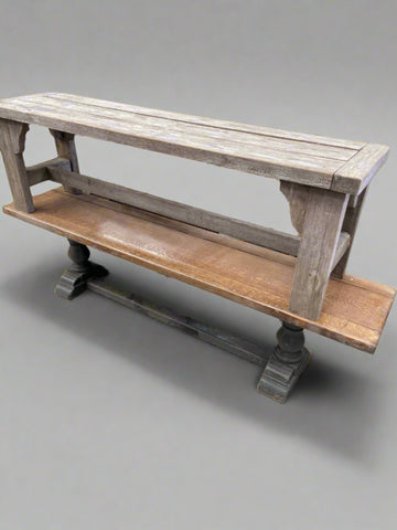 Long wooden bench with a painted base and natural varnished seat.