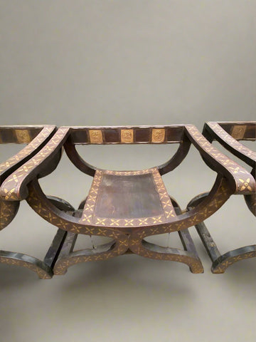 Mango wood yuyu chair decorated with gold metal crosses.