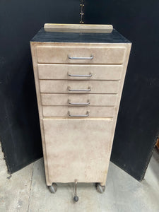 White medical storage drawers in an aged condition.&nbsp;