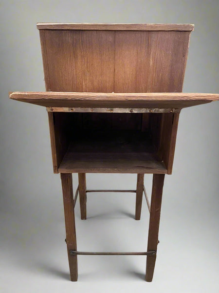 Unusual square wooden unit with a lift up flap which reveals hidden storage.