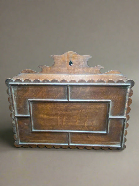 Antique wooden wall-mounted letter/magazine storage box with a hinged lid.