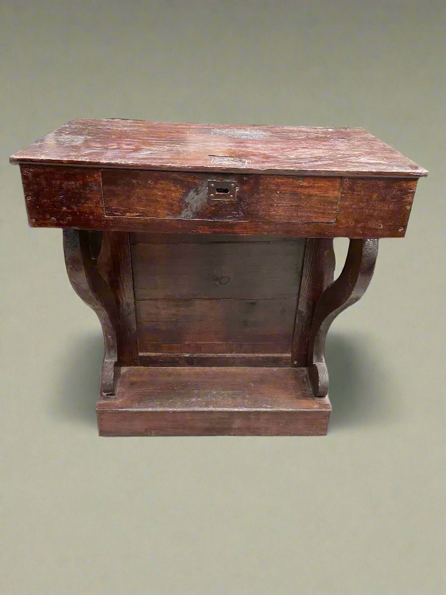 Antique writing desk with cabriole legs and a footrest.