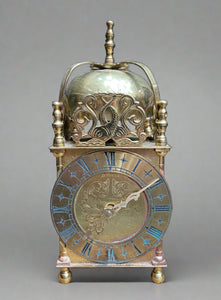 British vintage Smiths 8-day lantern clock with engraved fish and floral details. Circa 1940 or 1950s.