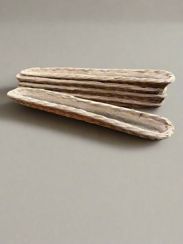 Rustic wicker baguette baskets with linen fabric lining.