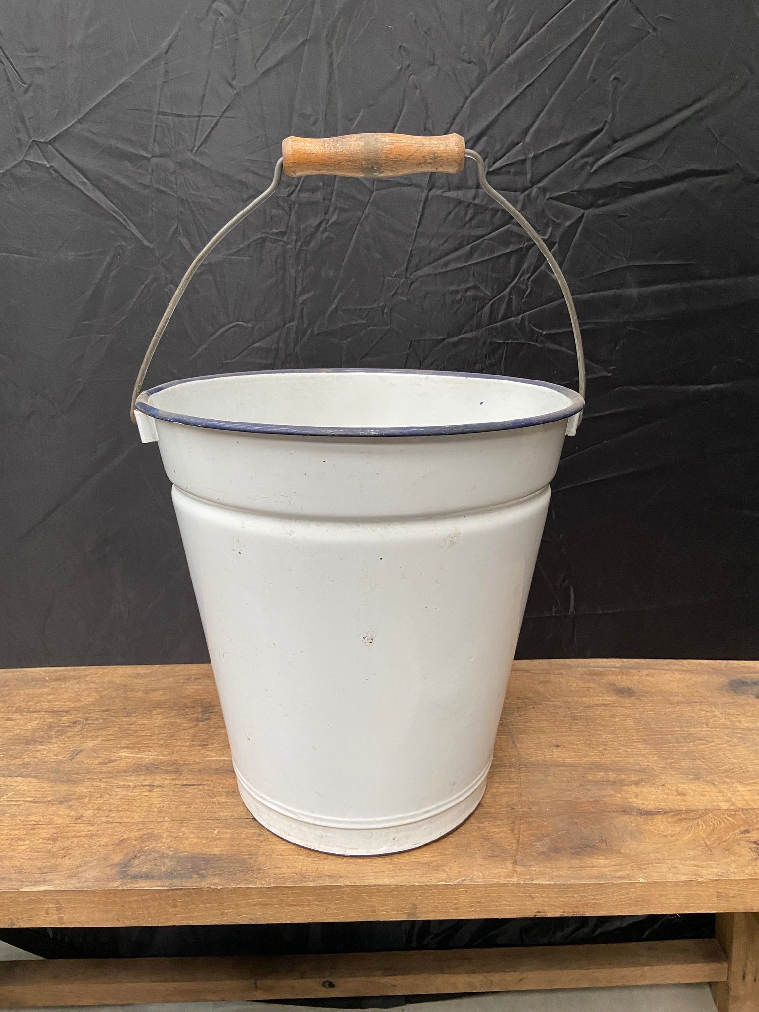White Bucket with a Wooden Handle