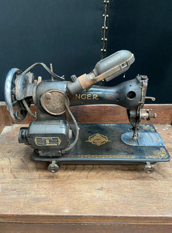 Antique Singer sewing machine, hand crank style. Circa 1930s, aged condition Film TV Props London