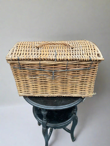 Large wicker hamper reinforced with metal wire and a wicker handle Film TV Props London