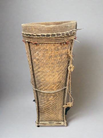 Large woven tribal standing basket, could be Malaysian or Vietnamese. eautiful details and complete with carrying strap.Large woven tribal standing basket, could be Malaysian or Vietnamese. Beautiful details and complete with carrying strap.