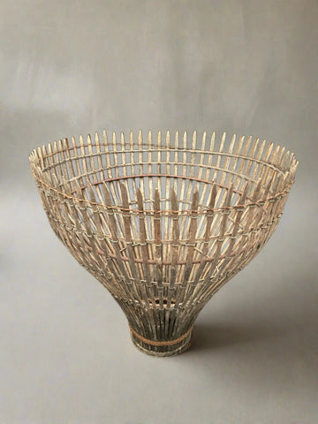 Ancient Thai or Vietnamese fish trap/basket with an open weave.