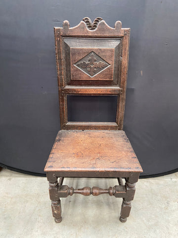 A Set of Carved Panel Back Chairs