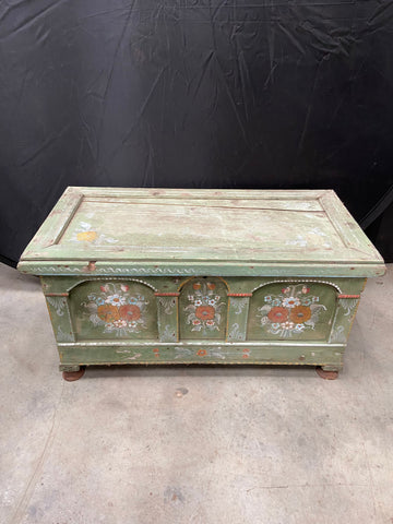 Green German dowry chest decorated with handpainted white and orange flowers. Could be used as a toy or blanket box. 