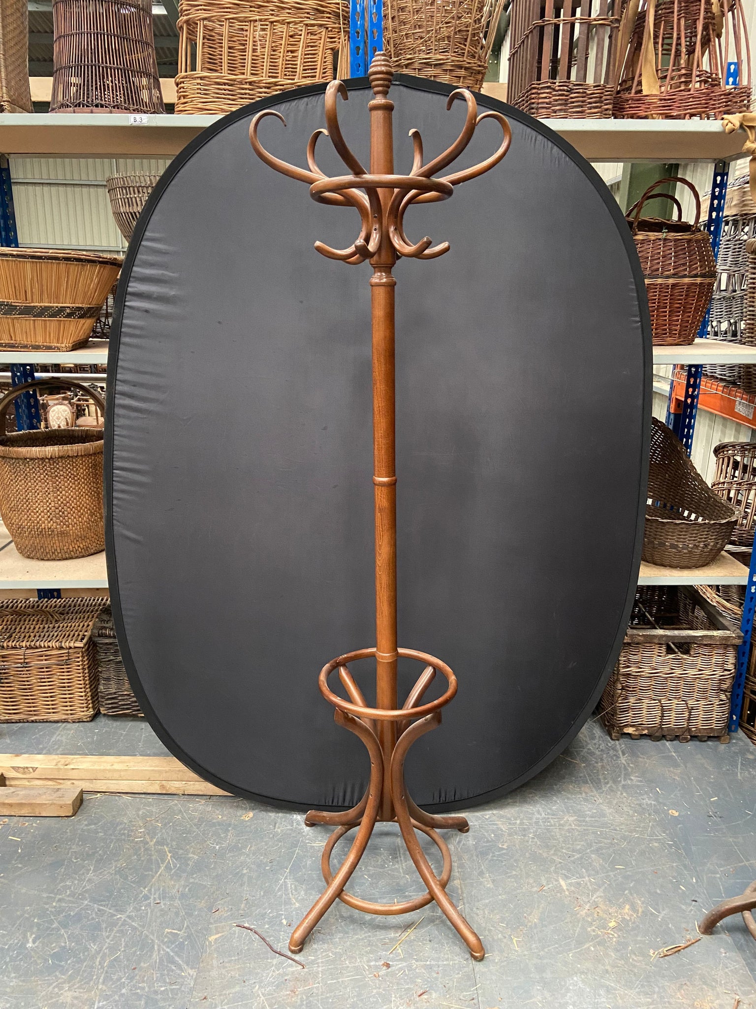 Large antique Bentwood stand topped with a carved finial in the shape of a beehive. 