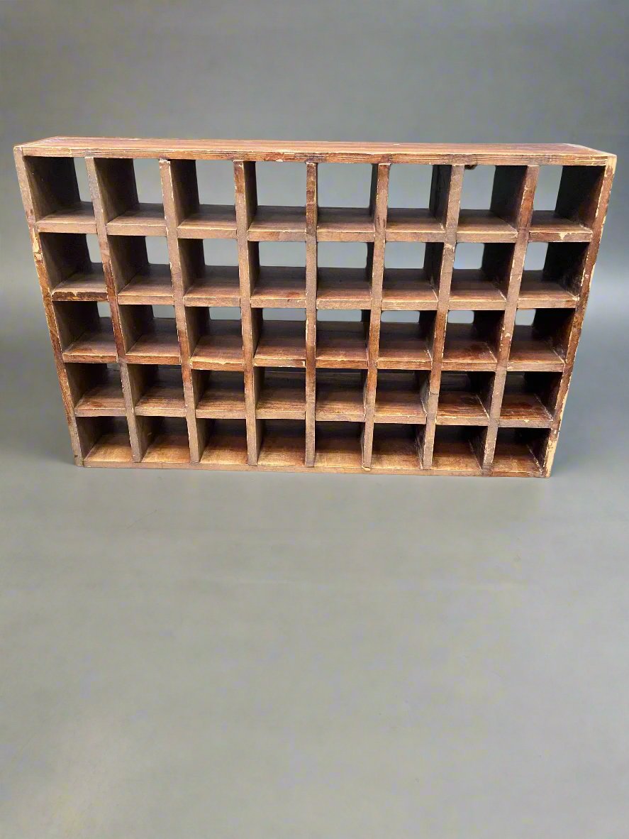 Industrial wooden pigeonhole storage unit, with 40 dockets. Circa 1920s-1940s. The type you might see in a printer's office or behind the check-in desk of a hotel.