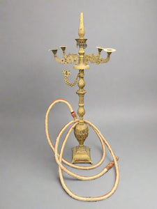 Large ornate vintage Indian brass hookah with one stem and hose and four candelabra arms.