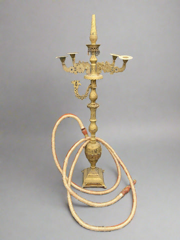 Large ornate vintage Indian brass hookah with one stem and hose and four candelabra arms.