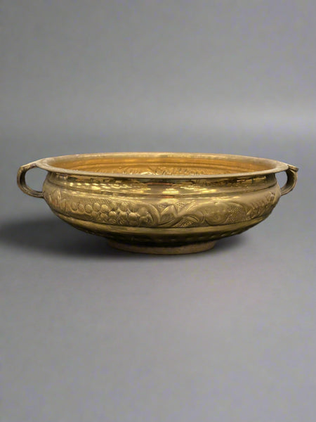 Large brass wash bowl with a detailed pattern around the outer bowl.