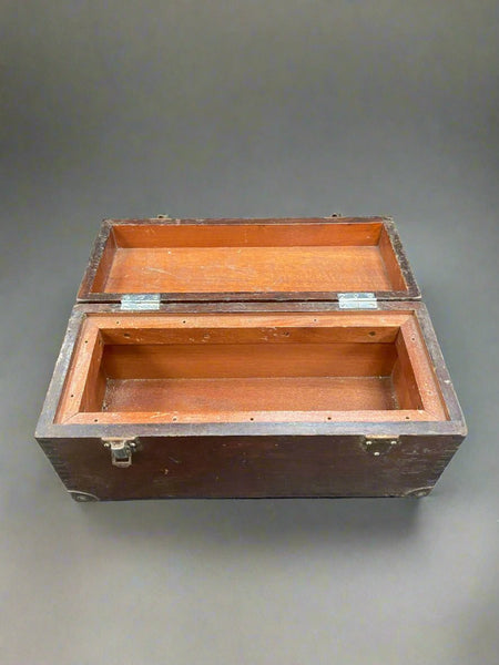 Antique workman's chest with a flat top and hinged lid.