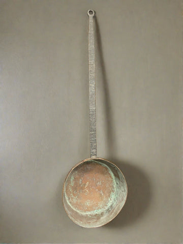 Rustic long-handled cooking skillet, likely French.