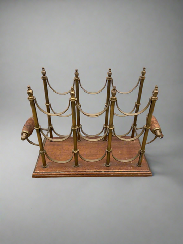 Vintage brass and wood bottle rack, circa 1960s.