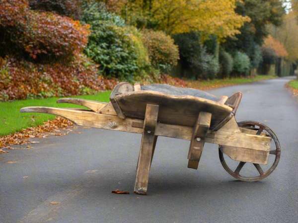 Antique country garden wheelbarrow, crafted from solid wood.