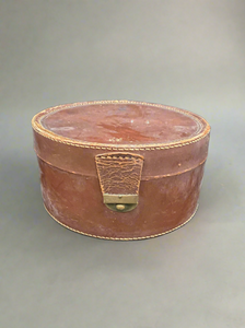 A pair of leather collar storage boxes, antique from the 1910s.