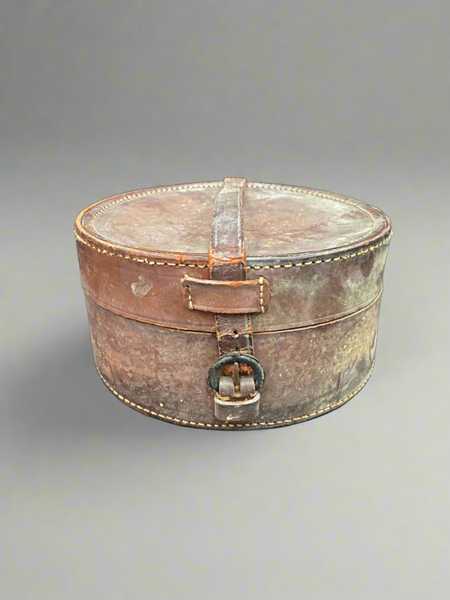 A pair of leather collar storage boxes, antique from the 1910s.