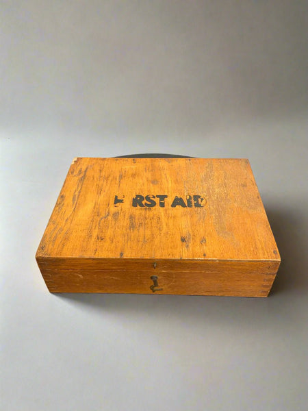 Wooden first aid box filled with medical supplies, circa 1938.