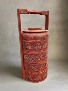 Antique red Burmese stacking/tiffin box with four sections.