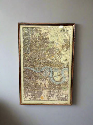 A large, vintage framed map of East London.