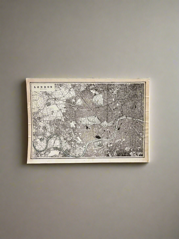 Vintage black and white map of London, printed on card.