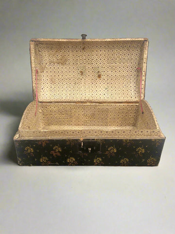 Antique black and yellow storage box, hand painted with red and yellow patterns.