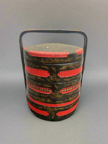 Antique Chinese bamboo wedding basket, painted with red, black and gold patterns.