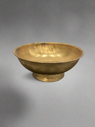 Round decorative gold storage bowl with a tarnished finish.